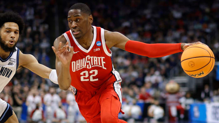 Ohio State Buckeyes guard Malaki Branham (22) dribbles the ball around Villanova Wildcats guard Caleb Daniels (14) in the first half during the second round of the 2022 NCAA Tournament.